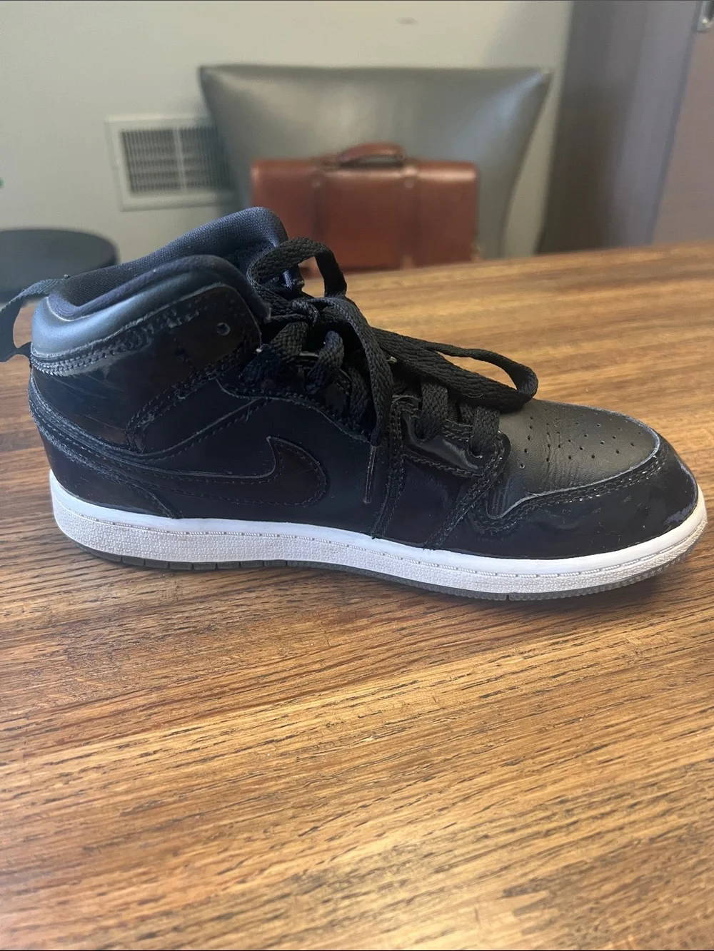 Black Nike High-Top Sneakers with White Sole - size 3